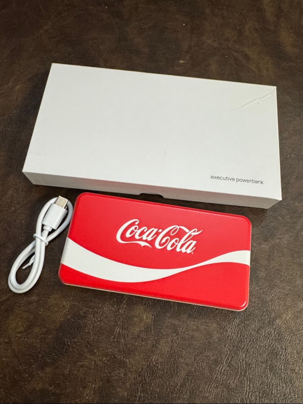 Coca-Cola Red Power Bank with White Wave Logo with manual and cord NIB